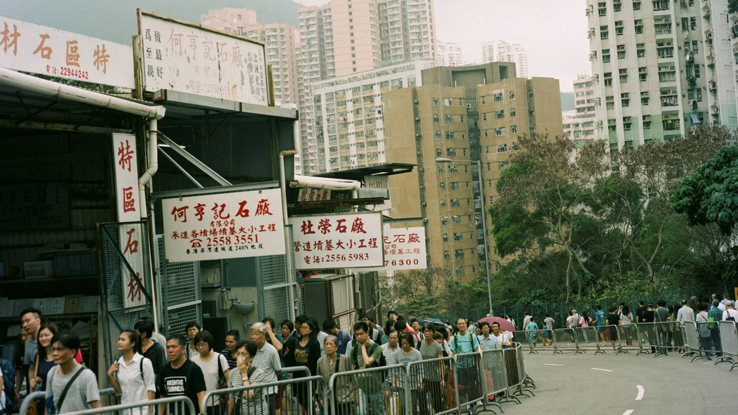 The invitation for Simone Rochas Spring/Summer 2019 show featured a recent Hong Kong cityscape captured by Rochas husband, Eoin McLoughlin, on a research trip during the Ching Ming (or Qingming) Festival, Credits: EOIN MCLOUGHLIN / COURTESY OF SIMONE ROCHA
 
