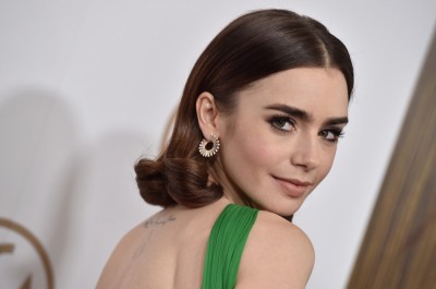 Najpiękniejsze kreacje Lily Collins z czerwonego dywanu 