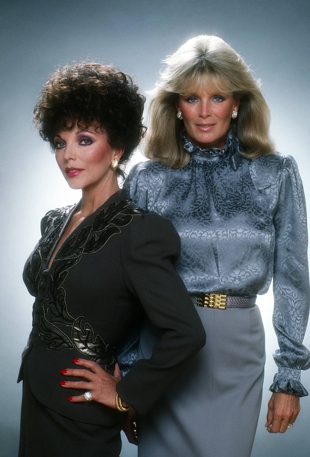 Joan Collins i Linda Evans jako Alexis Carrington Colby i Krystle Grant Jennings Carrington w serialu „Dynastia”