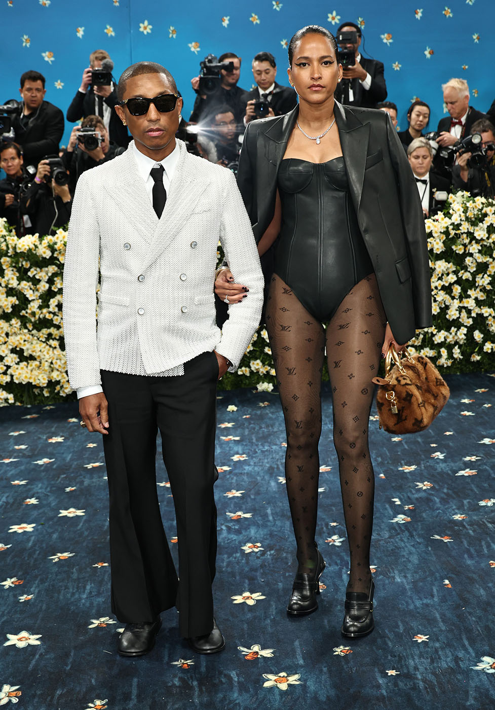 Pharrell Williams i Helen Lasichanh w stylizacjach Louis Vuitton