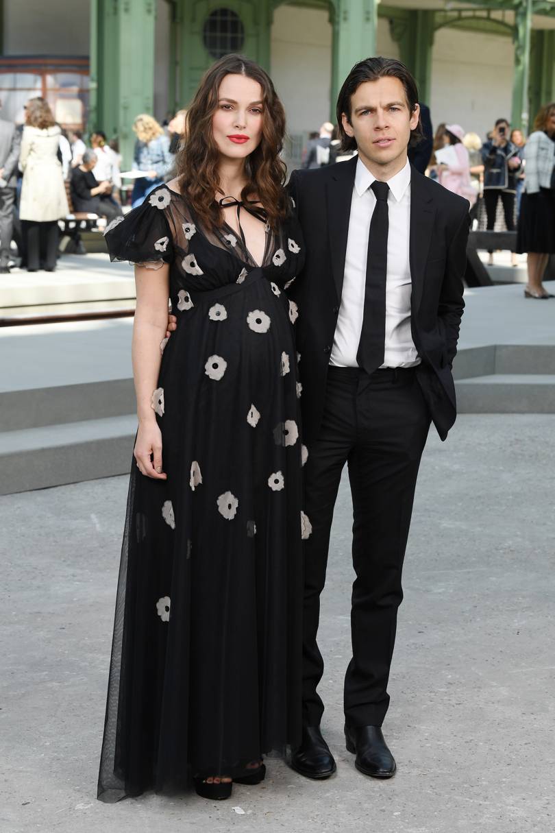 Keira Knightley, expecting a second baby, with her husband James Righton at the Chanel Cruise 2020 show in Paris, May 2019. Credit: GETTY IMAGES