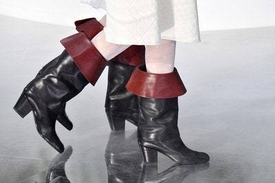 Boots  brushing the lower calf, Chanel, Autumn/Winter 2020
© Stephane Cardinale/Corbis/Getty