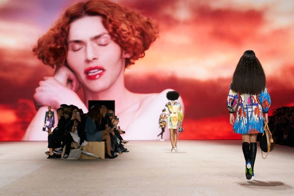 A video projection of singer Sophie forms the backdrop at the Louis Vuitton Spring/Summer 2020 show
© GoRunway.com