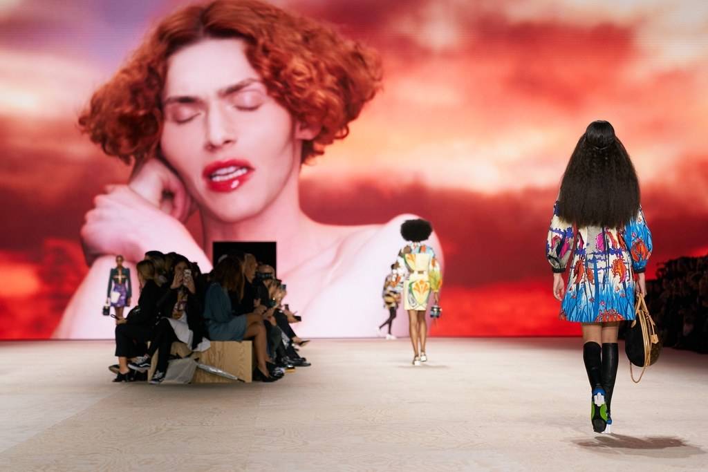 A video projection of singer Sophie forms the backdrop at the Louis Vuitton Spring/Summer 2020 show
© GoRunway.com