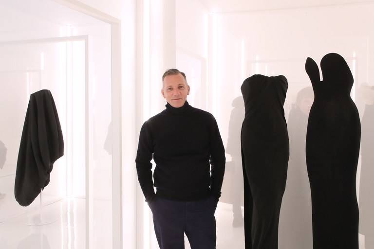 Curator Olivier Saillard with pieces by Balenciaga and Alaïa at his new exhibition, Sculptors of Form
© Bertrand Rindoff Petroff/Getty