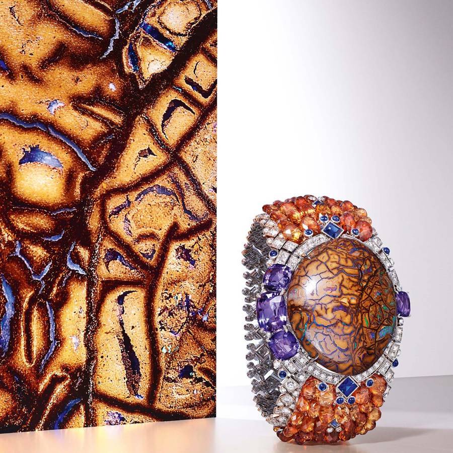 Credit: Cartiers Zemia bracelet from the Magnitude collection has a 77.27-carat matrix-opal centre, surrounded by blue and purple sapphires, garnets, and diamonds
CARTIER