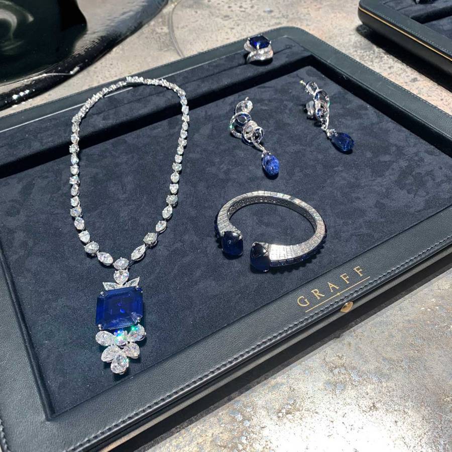 At Graff, a selection of sapphire and diamond jewellery, most notably a necklace featuring a 58-carat royal blue emerald-cut sapphire
Credit: GRAFF