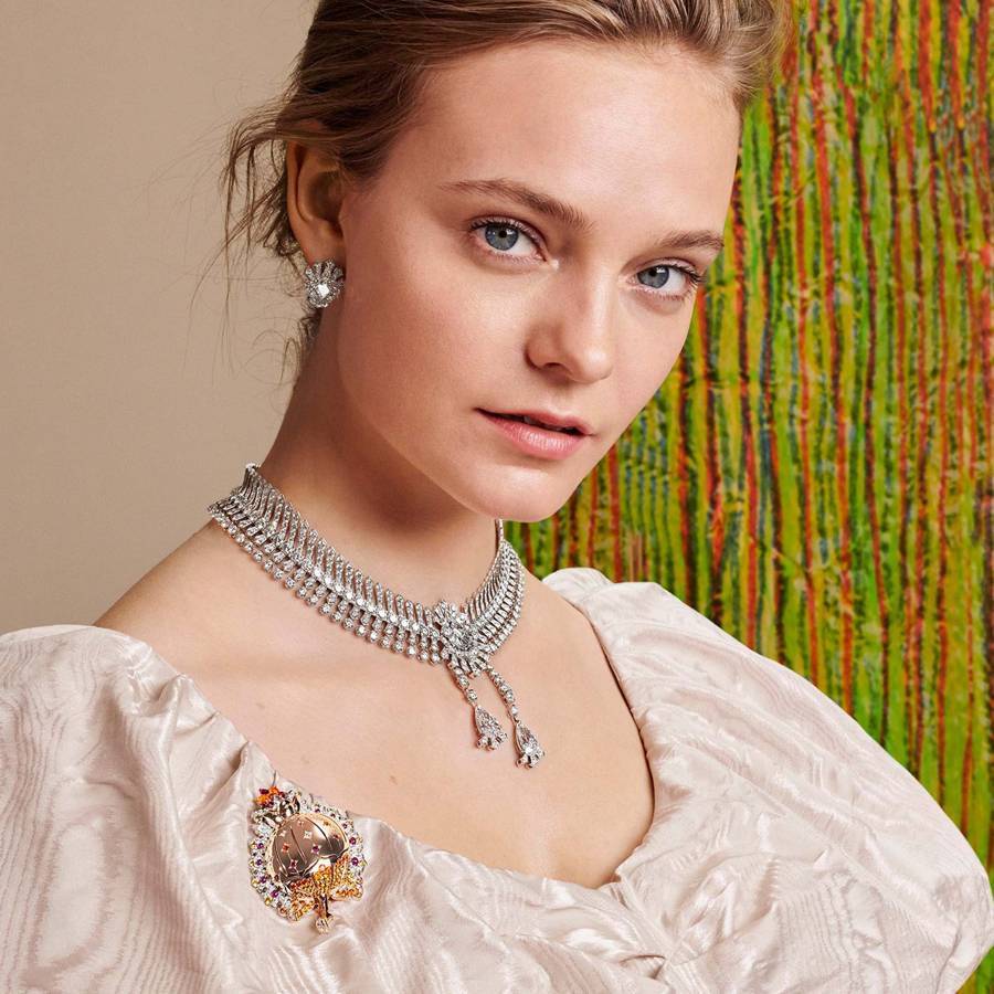 Van Cleef & Arpels Reticella necklace from the Romeo and Juliet collection echoes Renaissance ruffs. The Grenata clip is decorated with diamonds, rubies, spessartite, and yellow sapphires, whose warm colours suggest pomegranate seeds
Credit: VAN CLEEF & ARPELS