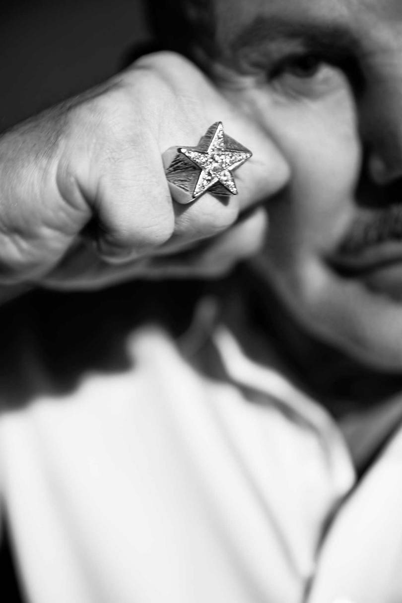 Thierry Mugler in 2008, wearing a star ring reminiscent of the iconic bottle for his Angel fragrance. Credit: MAX ABADIAN