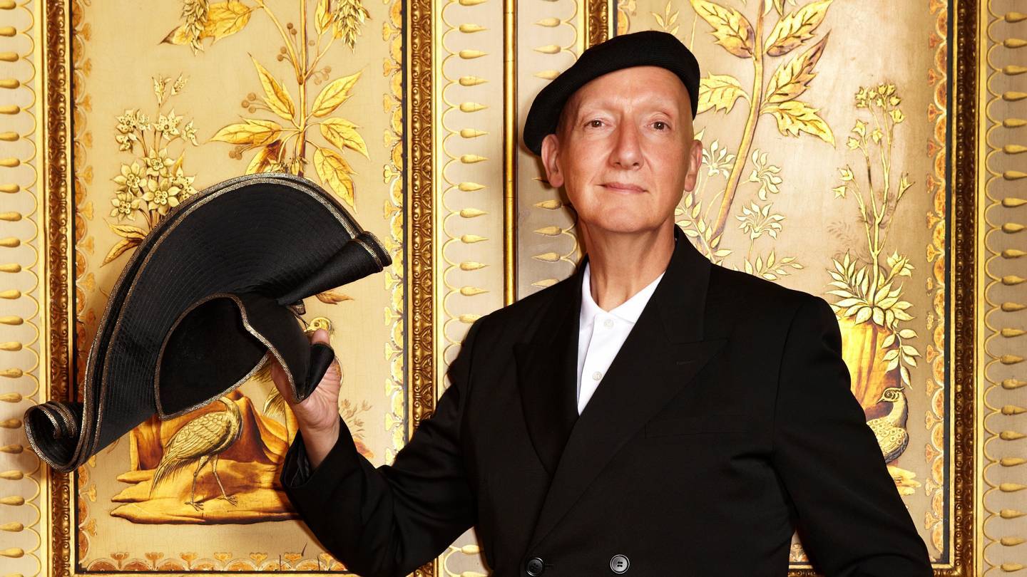 Jones in the Saloon of the Royal Pavilion, holding his Royal Crescent hat from the Chinoiserie on Sea Spring/Summer 2012 collection, which was inspired by the Brighton and Royal Pavilion. Credit:© TESSA HALLMANN / ROYAL PAVILION & MUSEUMS, BRIGHTON & HOVE