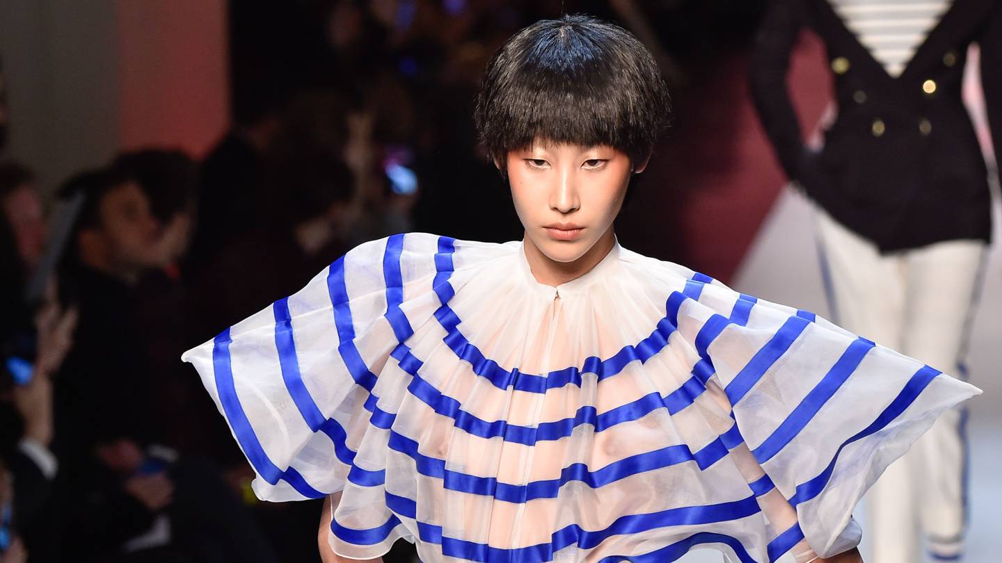 Marine stripes and inspiration from the Far East both featured in Gaultiers designs for Spring/Summer 2019. Credit: GETTY IMAGES