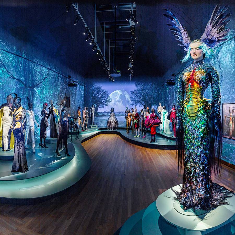 An installation at the exhibition, Thierry Mugler: Couturissime at the Montreal Museum of Fine Arts, 2019. The mannequin on the right showcases Thierry Muglers “La Chimère” gown, from the La Chimère collection, Haute Couture Autumn/Winter 1997–1998. Credit: MMFA