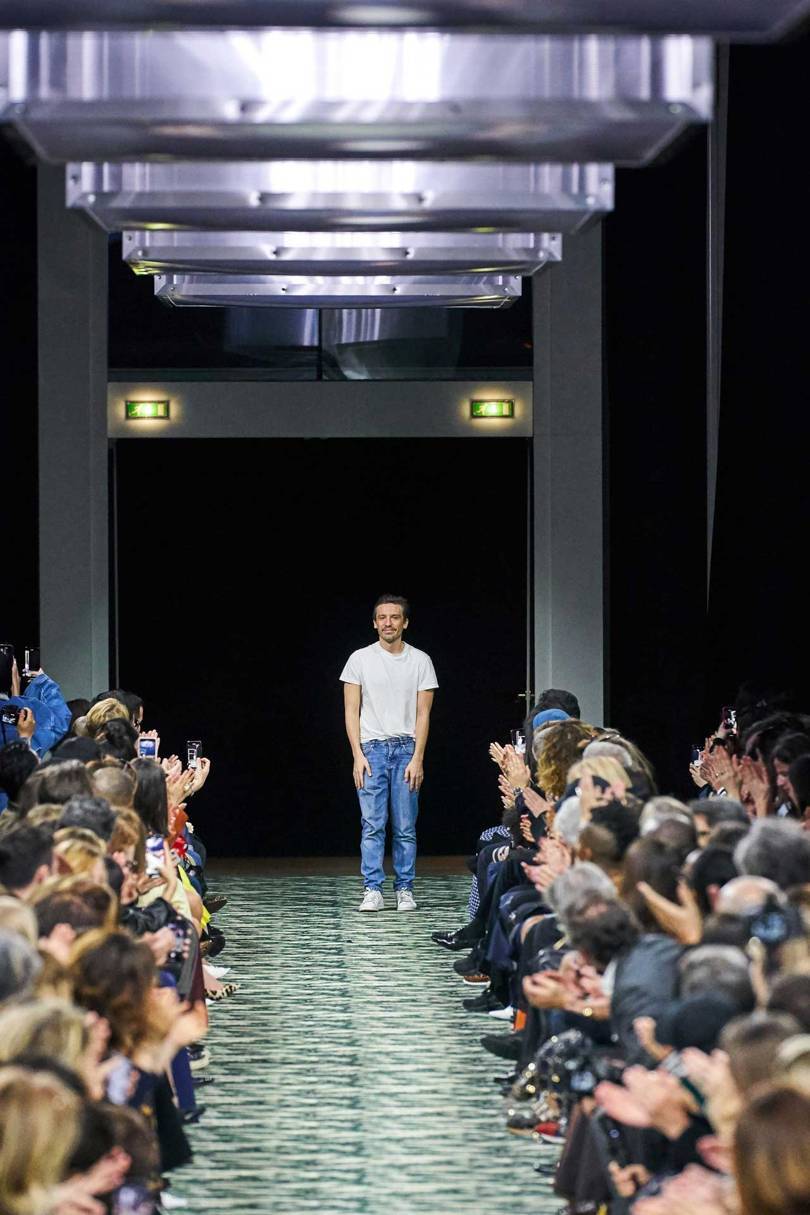 Julien Dossena, Creative Director of Paco Rabanne, takes a bow at the end of his Autumn/Winter 2019 show. Credit: GORUNWAY