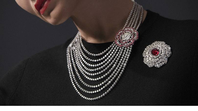 Chanel red incandescent transformable necklace in white gold, rubies and diamonds with a camellia that can be worn in many different variations. Credit: CHANEL