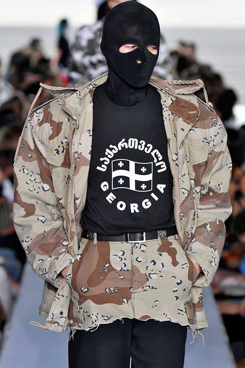 Demna and Guram Gvasalia, co-founders of Vetements, were born in Georgia in the former Soviet Union and featured Georgian slogans on their Spring/Summer 2019 Ready-to-Wear, while also referencing the nations war-torn past through camouflage and military-style balaclavas