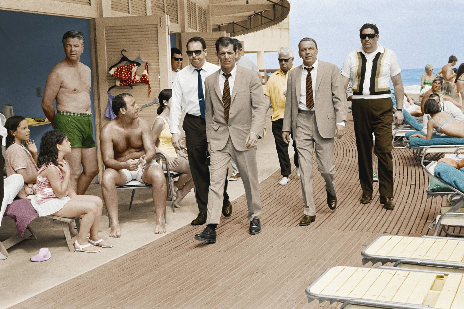 ‘Frank Sinatra with his minders and stand-in arriving at Miami Beach while filming The Lady in Cement’, 1968 (©Terry ONeill/Iconic Images)