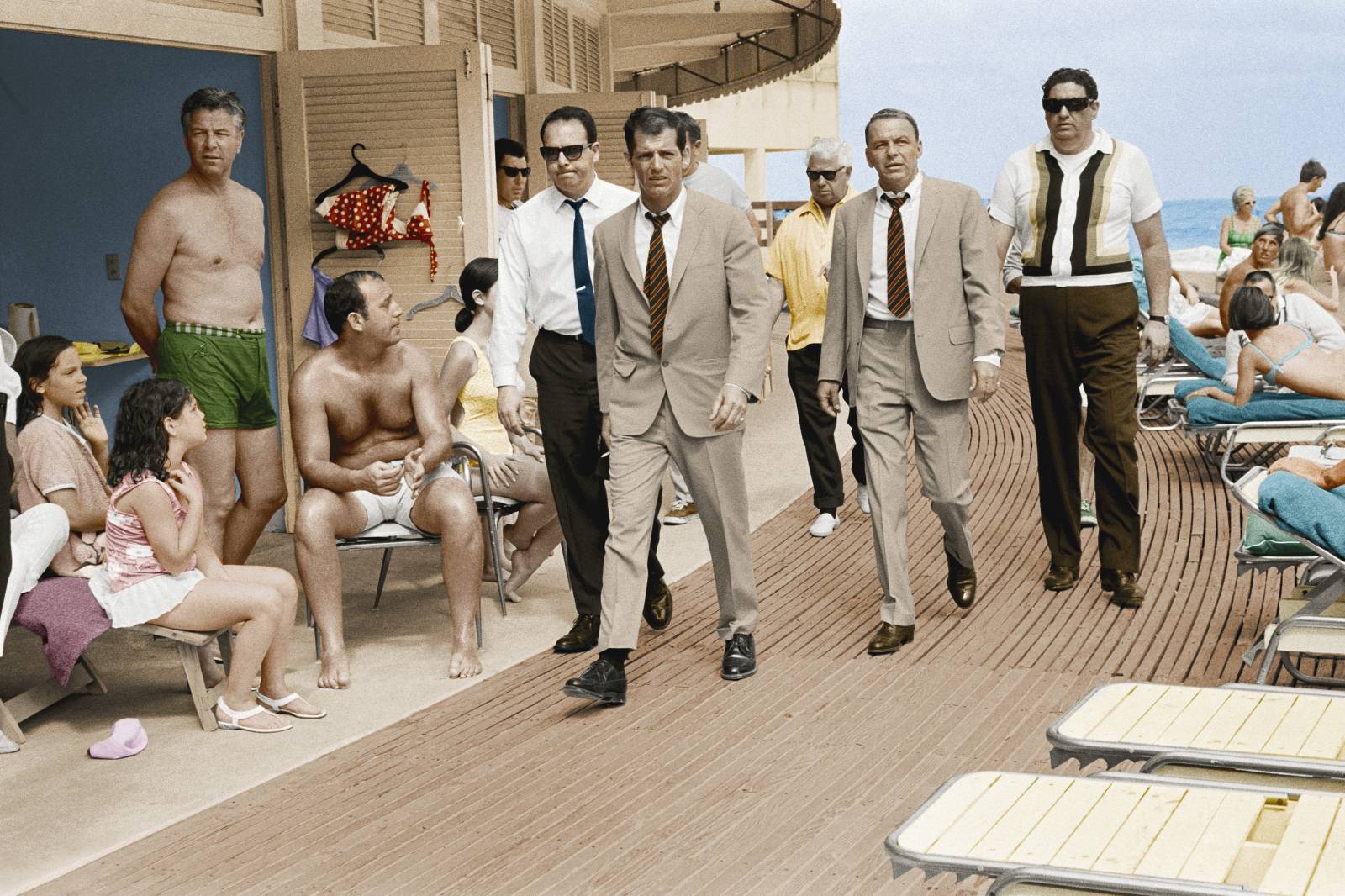 ‘Frank Sinatra with his minders and stand-in arriving at Miami Beach while filming The Lady in Cement’, 1968 (©Terry ONeill/Iconic Images)