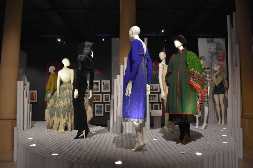 A catwalk made of rolled paper at the Chris Moore exhibition at the Bowes Museum. From left: Prada Spring/Summer 1996; Dior Spring/Summer 1998; Issey Miyake Autumn/Winter 1989; Chloé Spring/Summer 1983; Chloé Spring/Summer 1976; Yves Saint Laurent Autumn/Winter 1976; Chanel Spring/Summer 1969; and Paco Rabanne Spring/Summer 1969. Credit: Bowes Museum