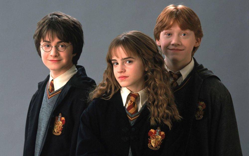 Daniel Radcliffe, Emma Watson i Rupert Grint w pierwszej części „Harryego Pottera” (Fot. materiały prasowe)