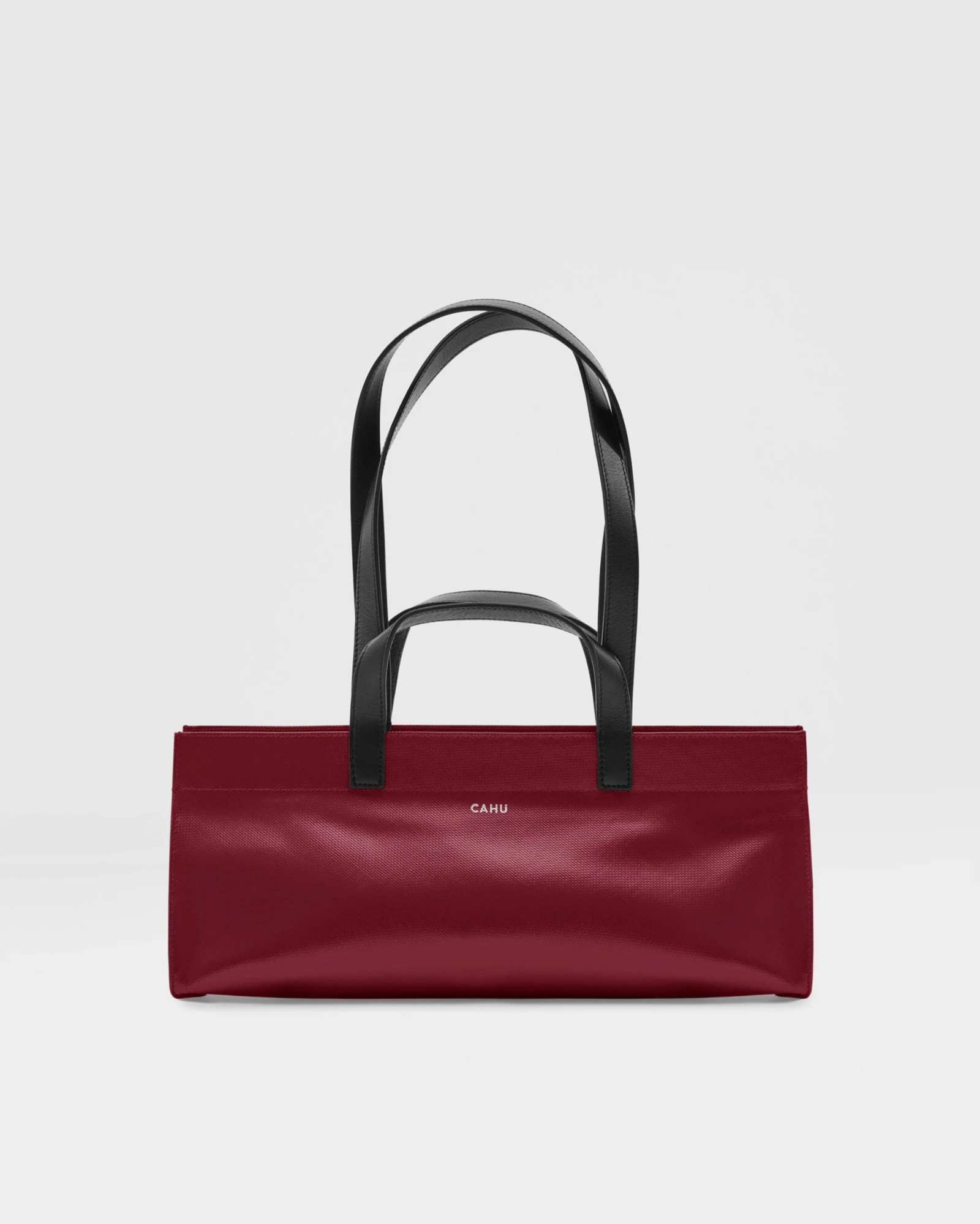 Torebka na ramię Cahu Le Mamie w kolorze burgundowym z czarnymi uchwytami. Elegancki design, idealna na co dzień.