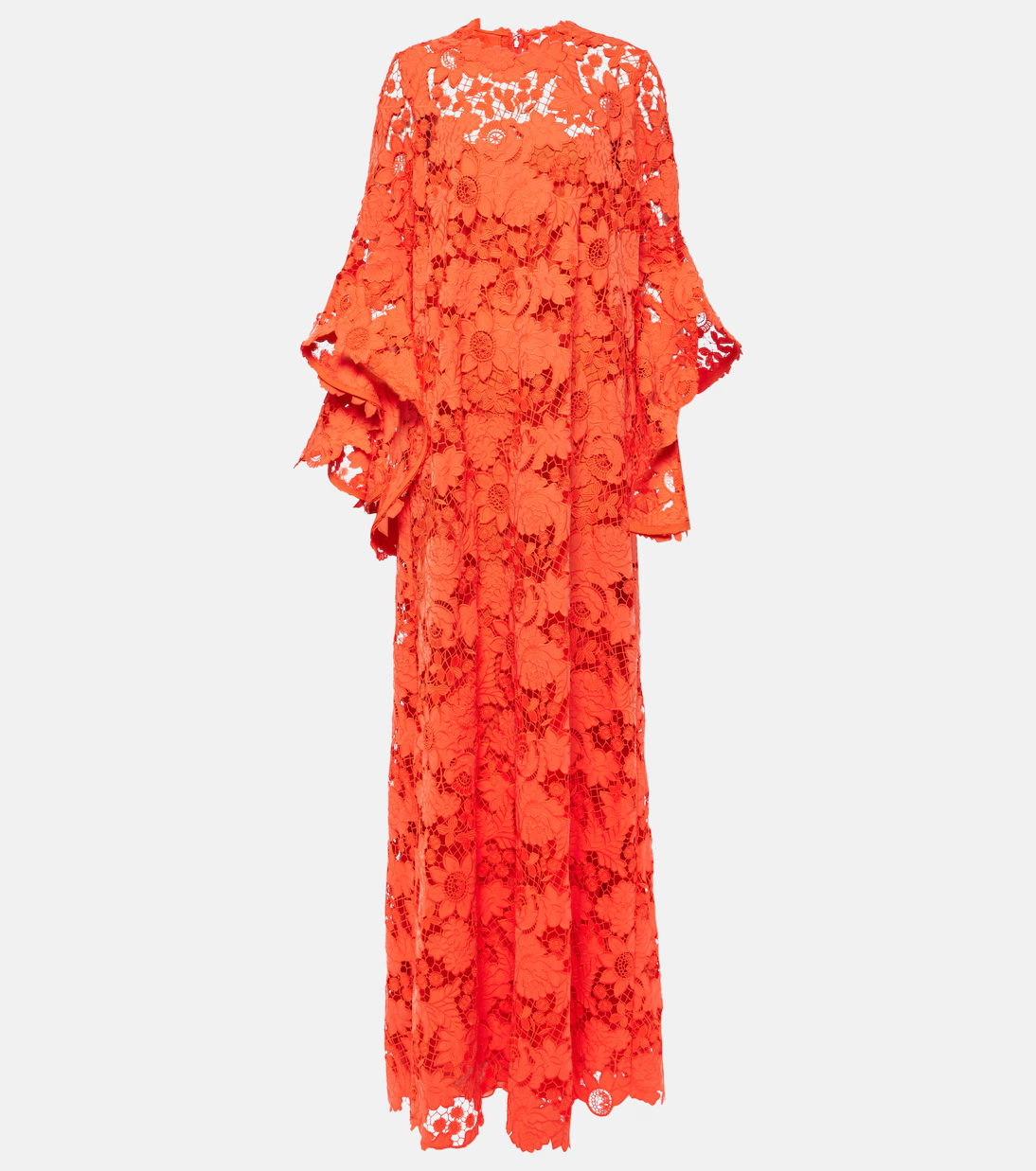 Pomarańczowa sukienka maxi w stylu boho od Oscar de la Renta, ozdobiona koronkowymi detalami.