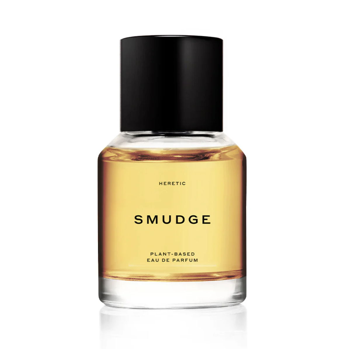 Perfumy "SMUDGE" marki Heretic w eleganckiej butelce, zawierające składniki roślinne.