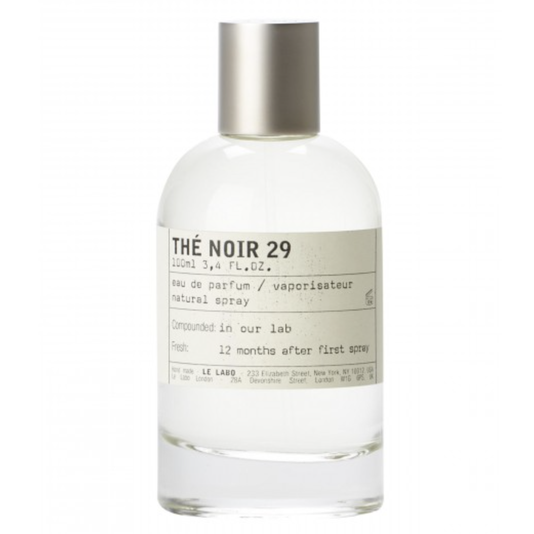 Szklana butelka perfum o nazwie "Thé Noir 29" (100 ml) z etykietą informacyjną.