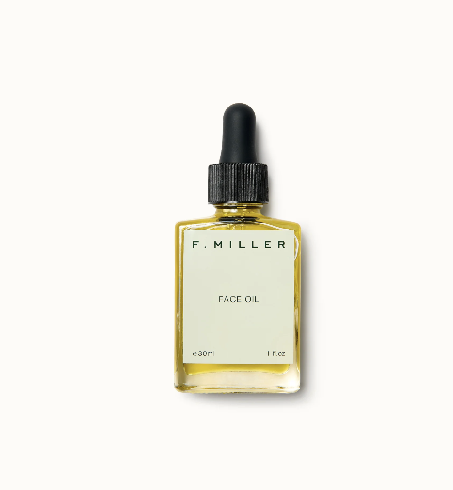 Butelka olejku do twarzy F. Miller o pojemności 30 ml, z czarną nakrętką i etykietą w jasnej kolorystyce.