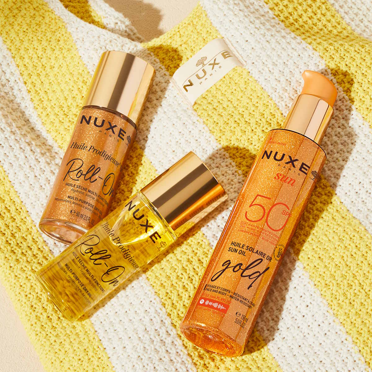 Huile Prodigieuse® Nuxe w nowej formie roll-onu, Rozświetlający olejek SPF 50.