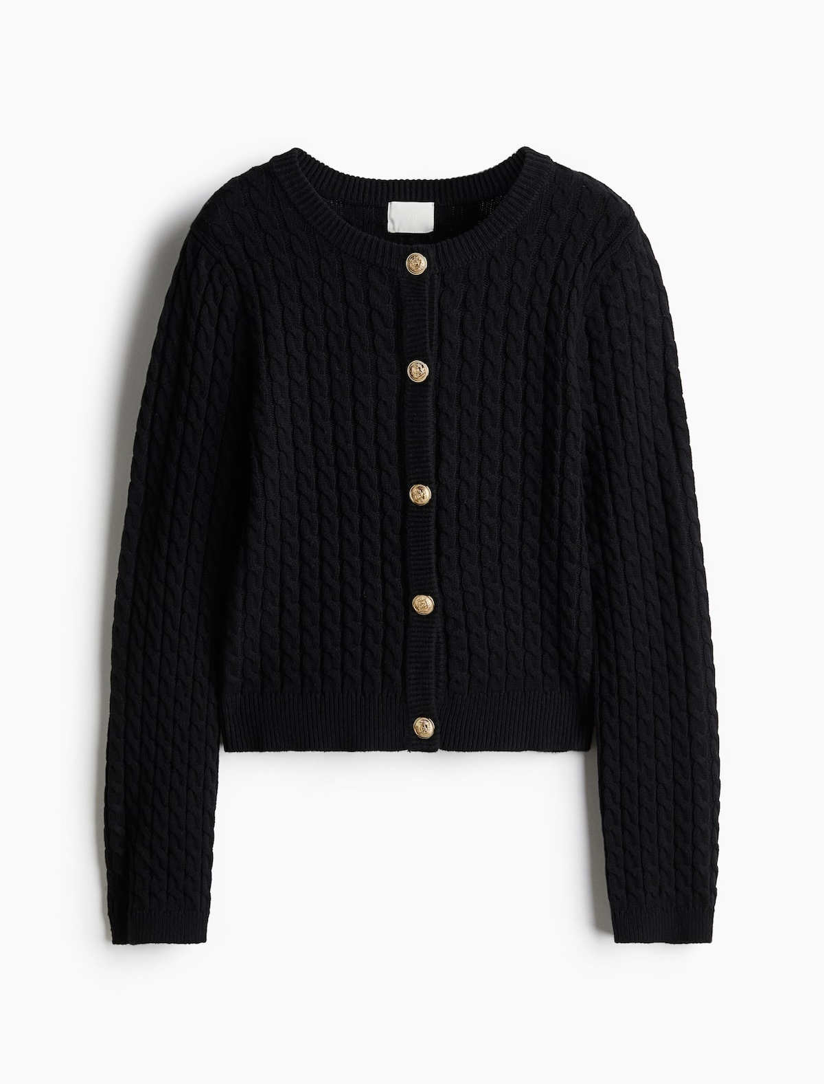 Czarny kardigan w warkoczowym splot marki H&M.