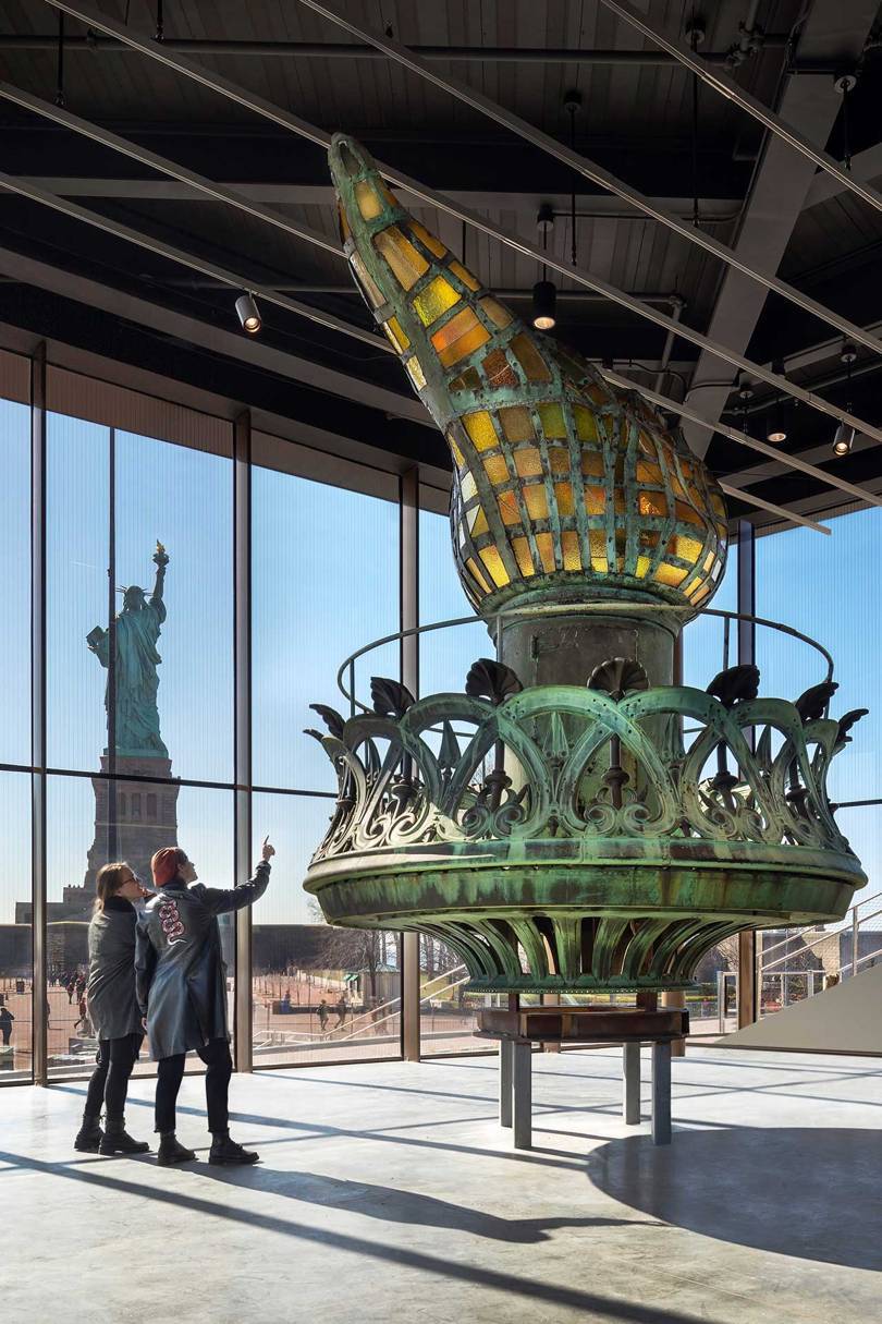 The Statue of Liberty’s original, 3,600-pound copper and amber-glass torch, designed by Frédéric Auguste Bartholdi. This torch was moved from Lady Liberty’s outstretched hand in 1984 and replaced with an exact replica, gilded to Bartholdi’s original specifications, when the newly restored statue reopened to the public on Liberty Weekend to celebrate her centennial in 1986. The original torch is now in the Inspiration Gallery of the new Statue of Liberty Museum. Credit: DAVID SUNDBERG