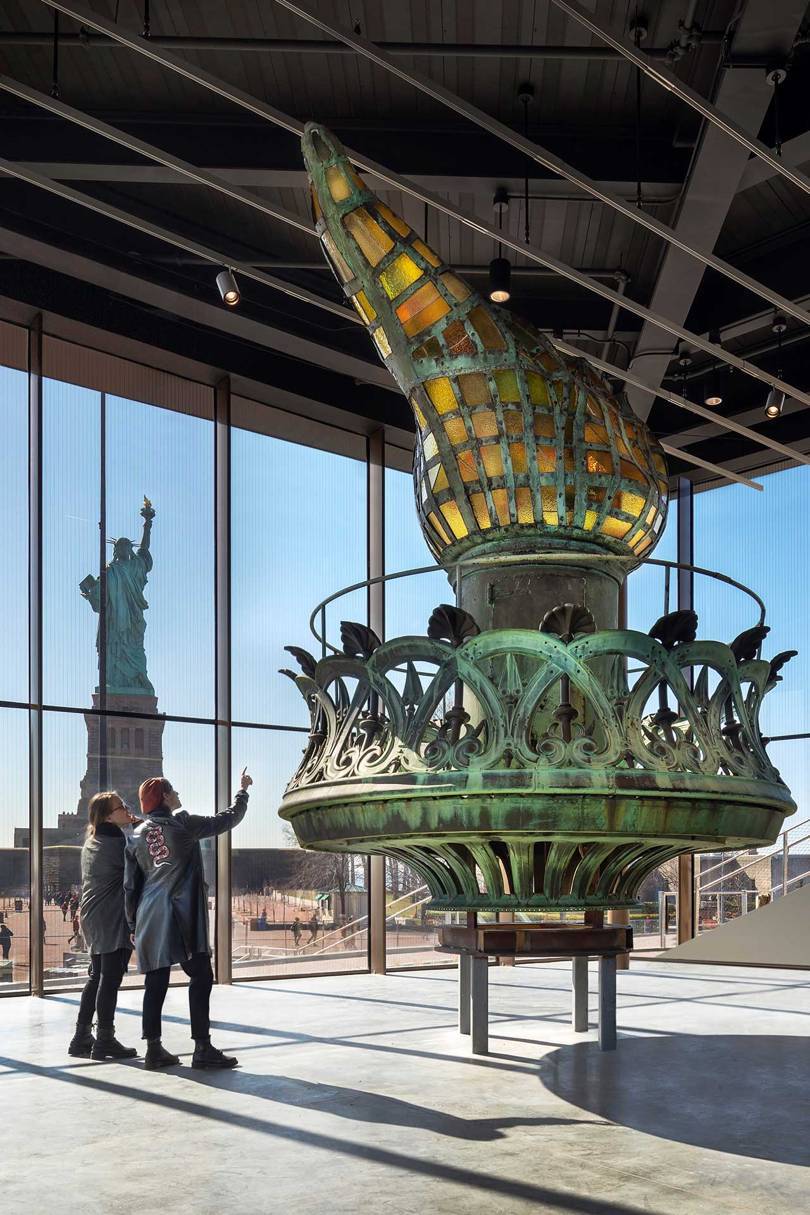 The Statue of Liberty’s original, 3,600-pound copper and amber-glass torch, designed by Frédéric Auguste Bartholdi. This torch was moved from Lady Liberty’s outstretched hand in 1984 and replaced with an exact replica, gilded to Bartholdi’s original specifications, when the newly restored statue reopened to the public on Liberty Weekend to celebrate her centennial in 1986. The original torch is now in the Inspiration Gallery of the new Statue of Liberty Museum. Credit: DAVID SUNDBERG