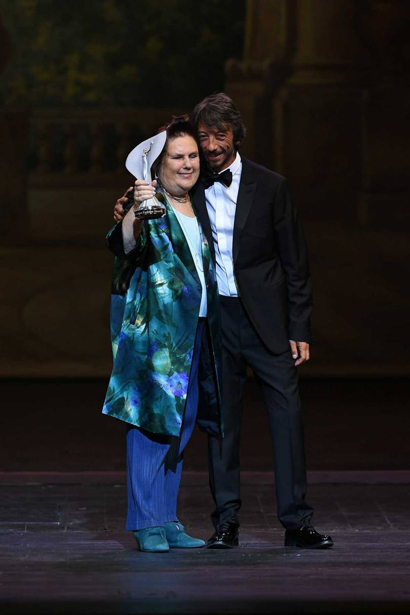 Pierpaolo Piccioli, Creative Director of Valentino, presents Suzy Menkes with the Visionary Award from the Green Carpet Fashion Awards 2018, held in Milan
GCFA