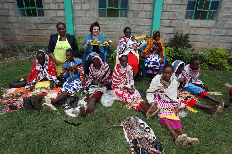Suzy visiting a team of Masai beaders in Gilgil, Kenya, in 2012. The beaders were working for the ITC (International Trade Centre) as part of a United Nations initiative. Credit: @SUZYMENKESVOGUE