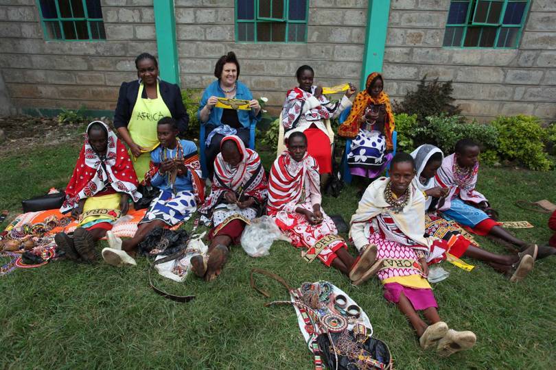 Suzy visiting a team of Masai beaders in Gilgil, Kenya, in 2012. The beaders were working for the ITC (International Trade Centre) as part of a United Nations initiative. Credit: @SUZYMENKESVOGUE