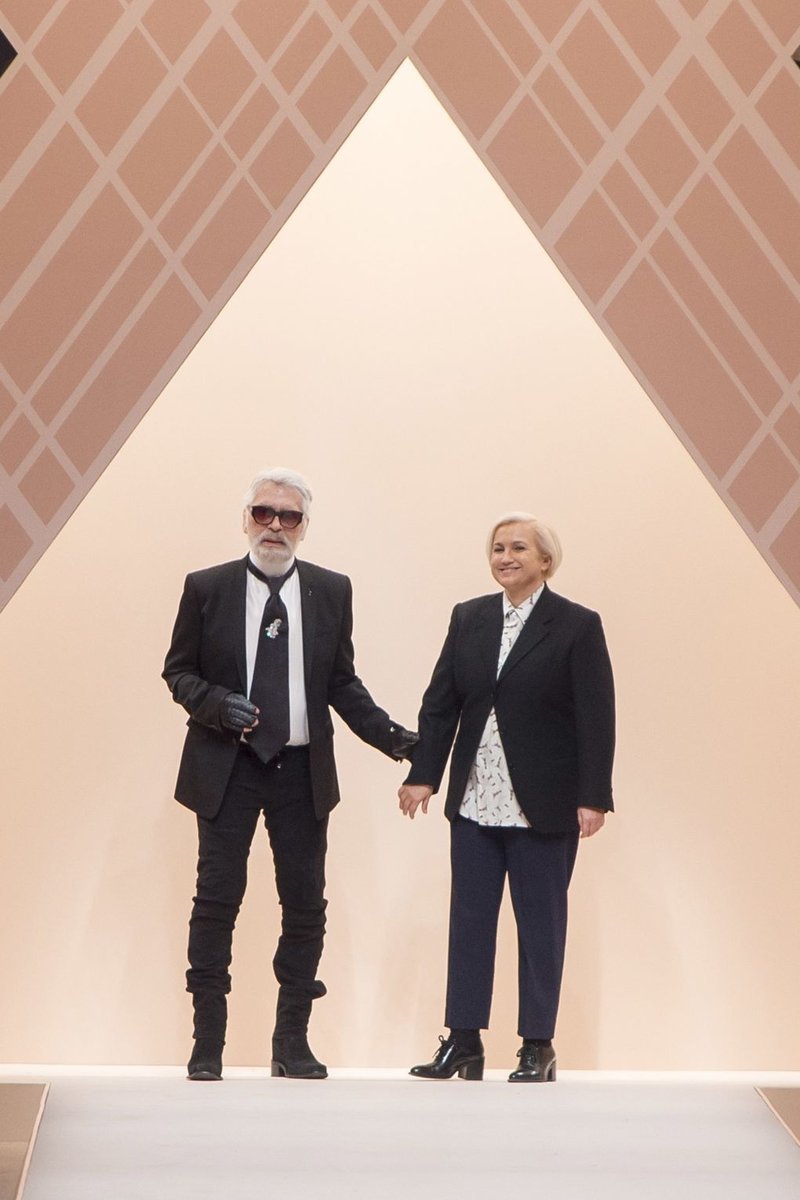 Karl Lagerfeld and Silvia Venturini Fendi, who design the Fendi collections together, take a bow at their Autumn/Winter 2018 show in Milan (Photo: INDIGITAL.TV)