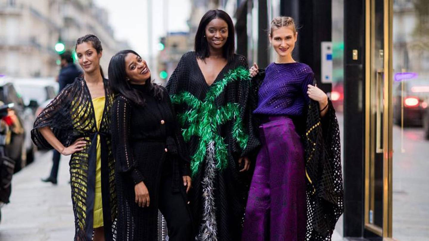 Folake Folarin-Coker (centre), the Nigerian designer behind the Tiffany Amber brand, with models wearing ensembles from her Spring/Summer 2019 collection. Credit: TIFFANY AMBER