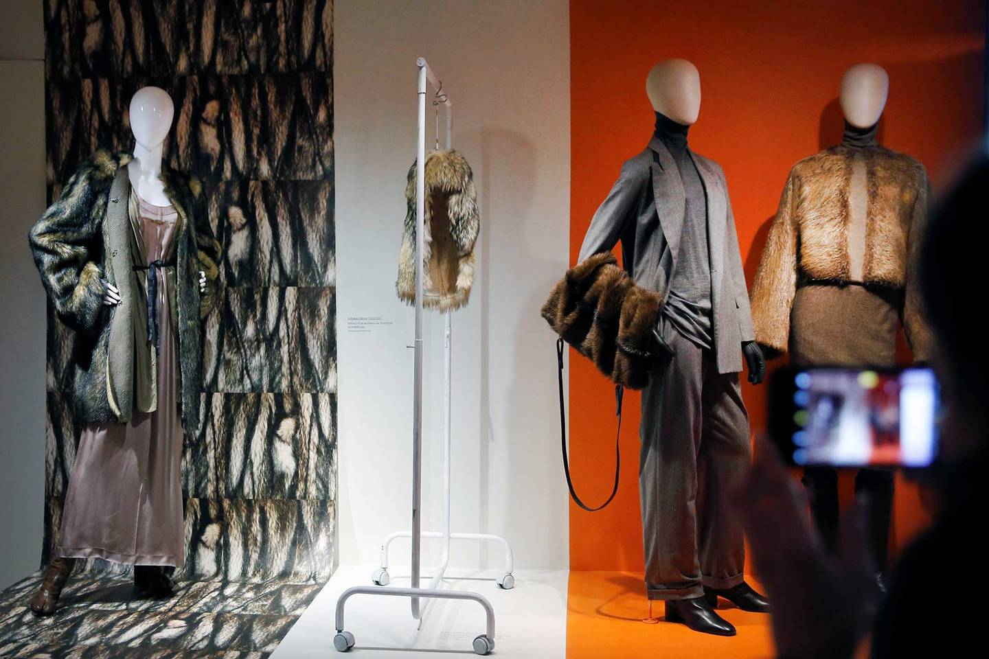 An installation at the exhibition Margiela: The Hermès Years at the Musée des Arts Décoratifs in Paris, showcasing the contrasting house colours at Margiela and Hermès (Photo: Getty Images)