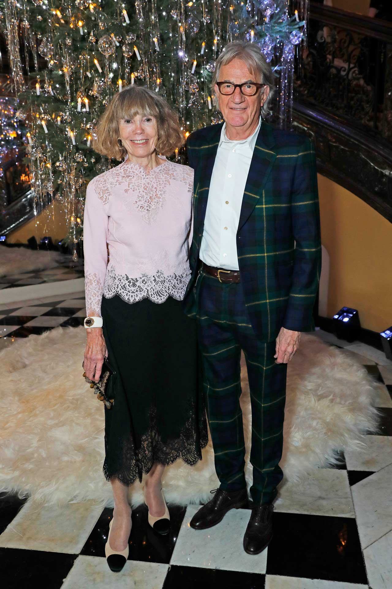 Sir Paul Smith and his wife, Pauline Denyer, at Claridges Christmas party in 2017. Denyer trained in fashion at the Royal College of Art and encouraged Smith to pursue it as a career (Photo: Getty Images)
