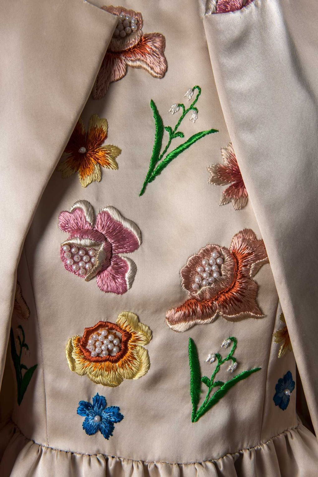 Detail of a Givenchy satin evening ensemble, comprising a dress with an embroidered bodice and a coat, worn by Jackie Kennedy for an official visit to France in Summer 1961 (Photo: Luc Castel, Givenchy)