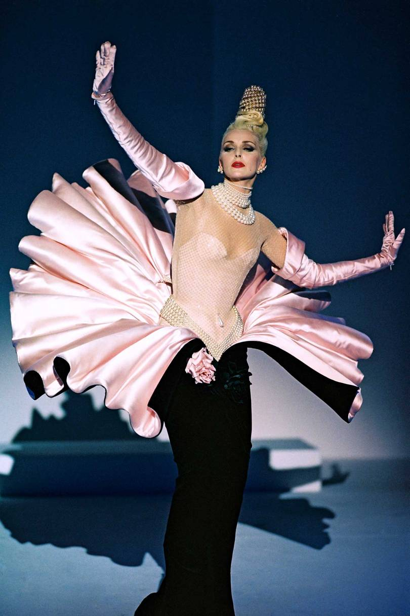 Simonetta Giarfelici wears an evening ensemble from the Thierry Mugler Ready-to-Wear Autumn/Winter 1995 Twentieth Anniversary at the Cirque dHiver collection (© PATRICE STABLE / THIERRY MUGLER)